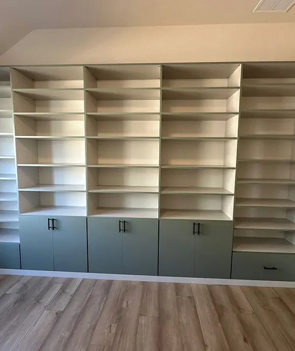 Wall unit by Closet Factory San Antonio shelving and pull out drawers for office