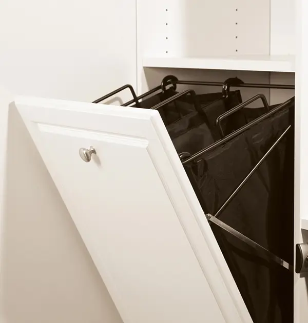 Tiling hamper in laundry room cabinet
