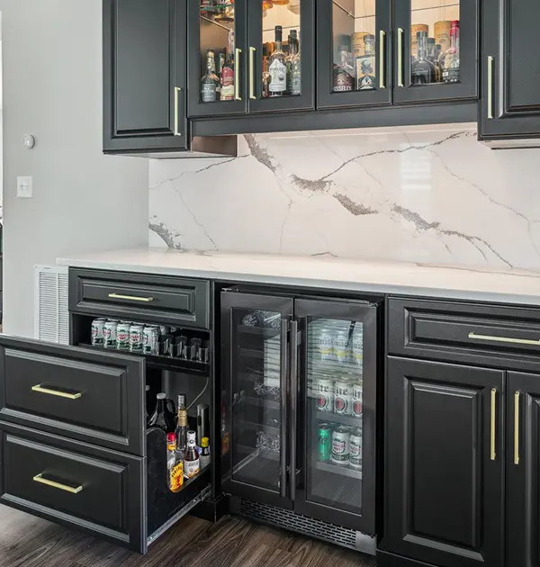 Pull out beverage drawers and mini fridge in custom pantry