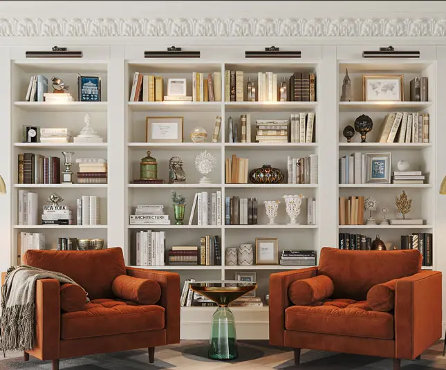 Custom. white library wall unit with two reading chairs set in front