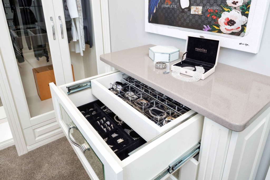 open jewelry drawer with lucite dividers