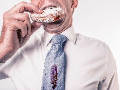 man eating donut