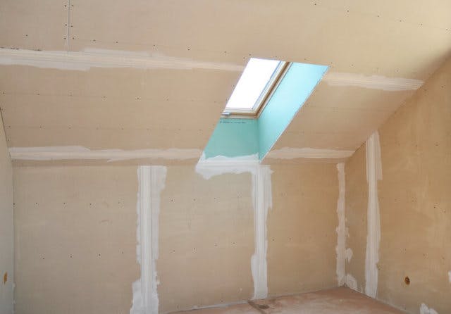 A skylight in a room currently under construction