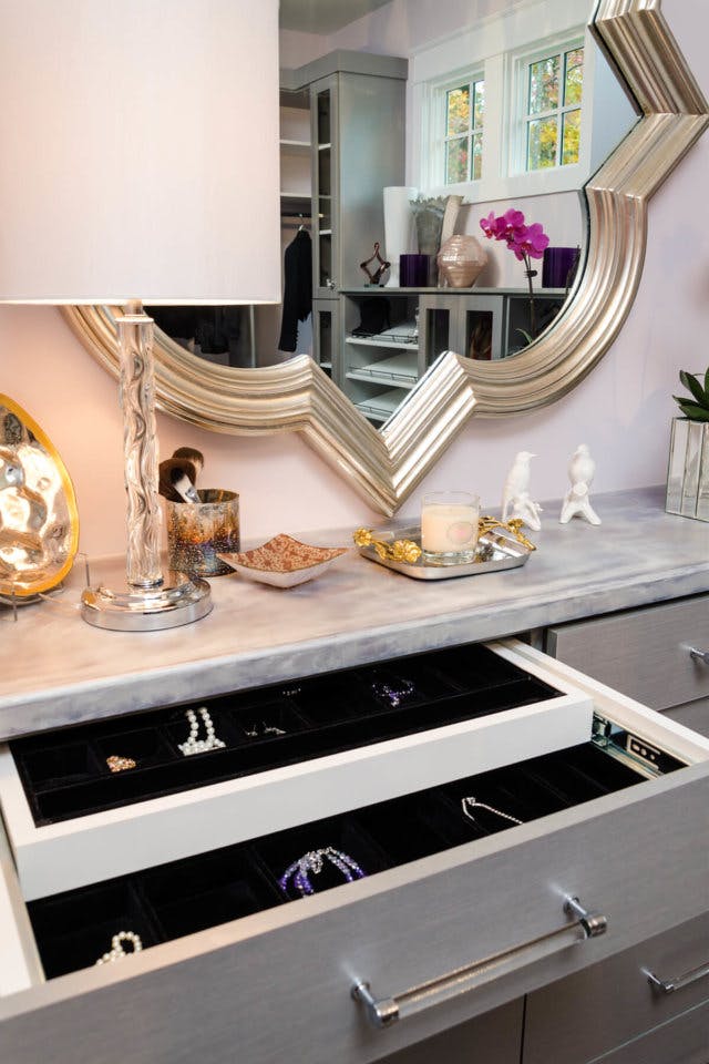 A jewelry cabinet under a countertop