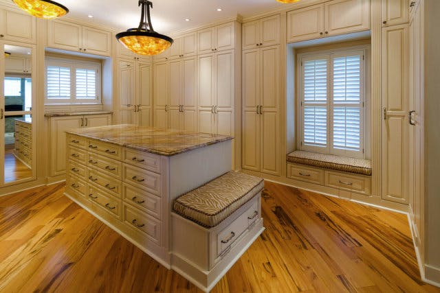 A walk-in closet with everything hidden behind doors