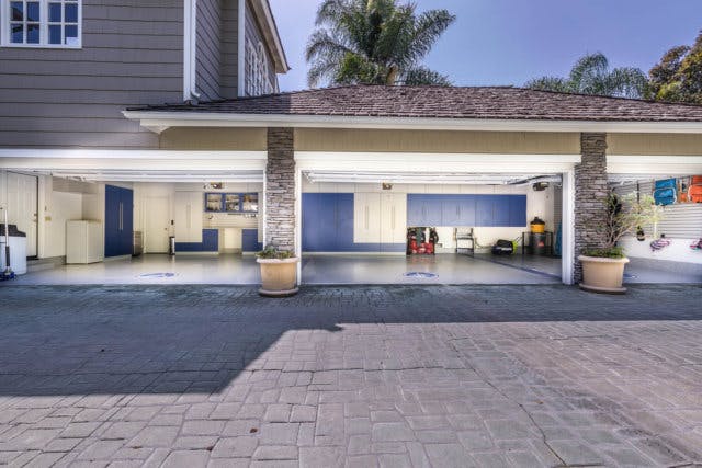 An open three-car garage