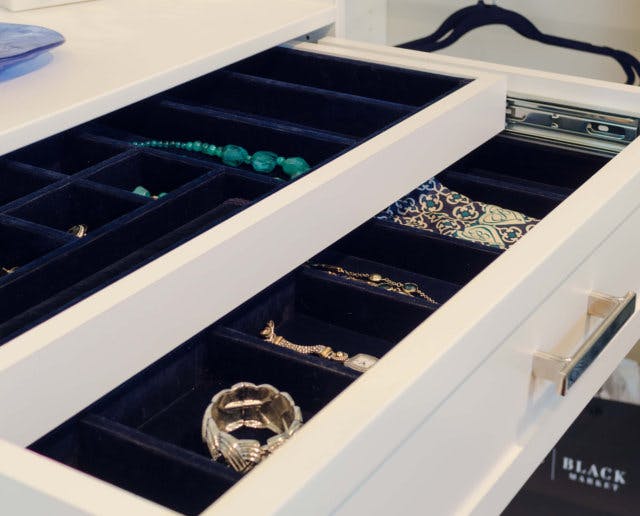 Jewelry drawers with blue velvet organizer inserts