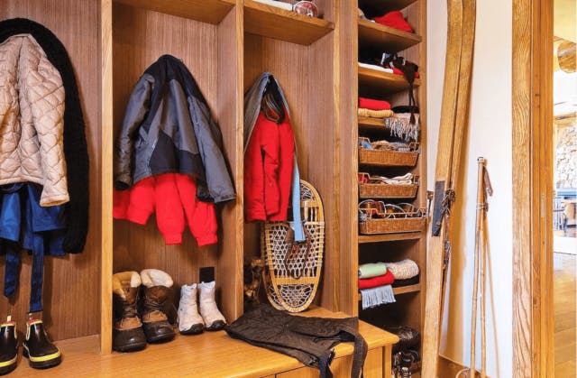 A medium color wood mudroom