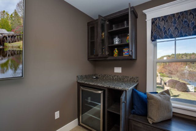 Unused wall space converted into bar storage.