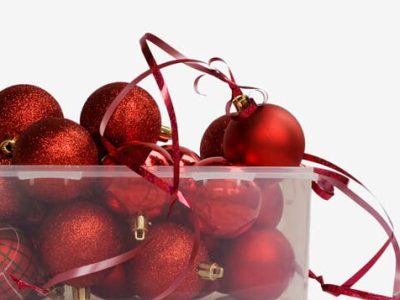 christmas ornaments stored in a plastic bin