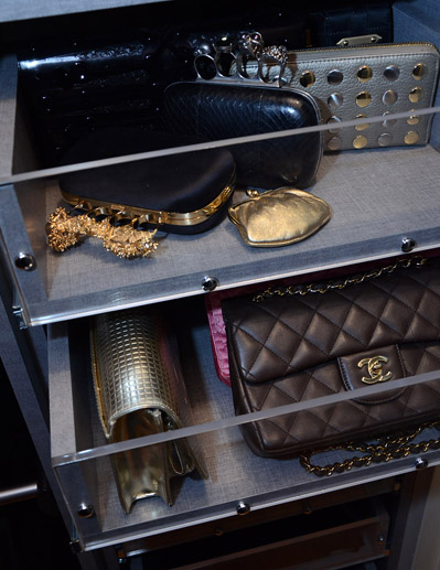 Custom drawers with Lucite fronts designed to store Jill's smaller purses and clutches.