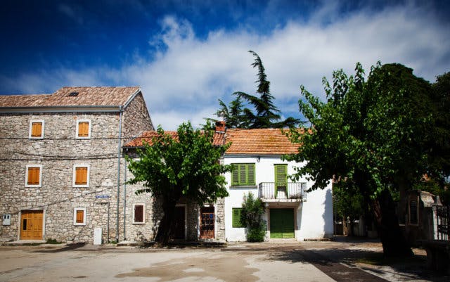 Old houses in a row. It appears to be in Europe