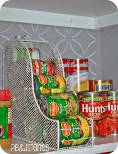 wire can rack with cans in it