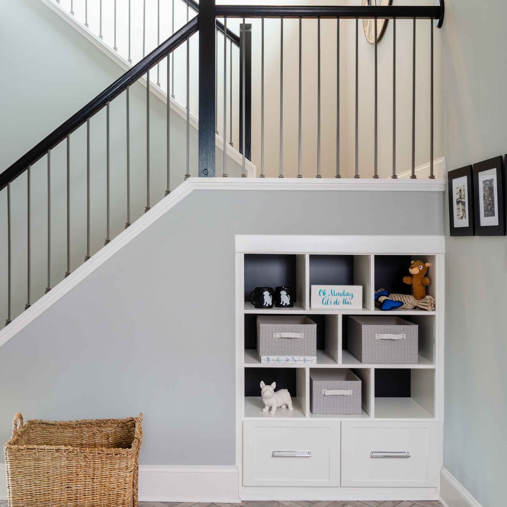 built-in shelves under staircase