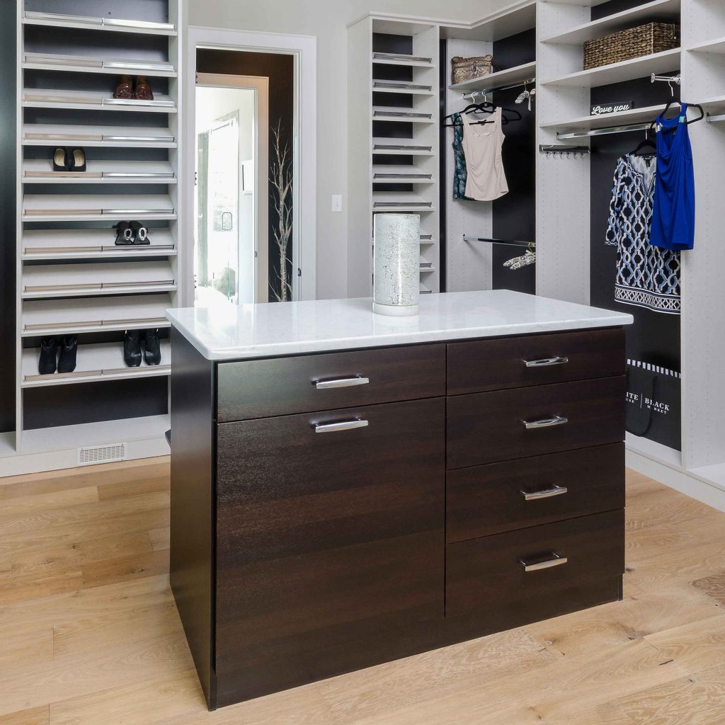 white and dark wood two tone closet