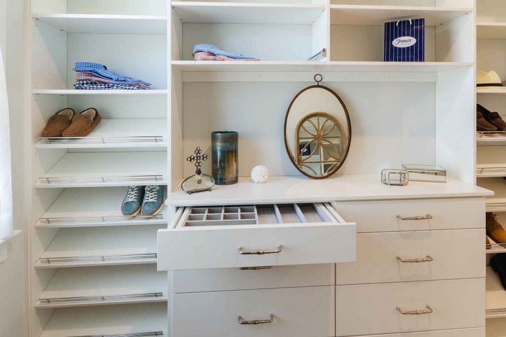 staged closet with open drawer