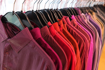 color coded shirts on hangers