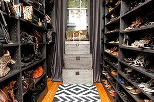 Custom Walk In Closet with Tall Shoe Rack - Transitional - Closet