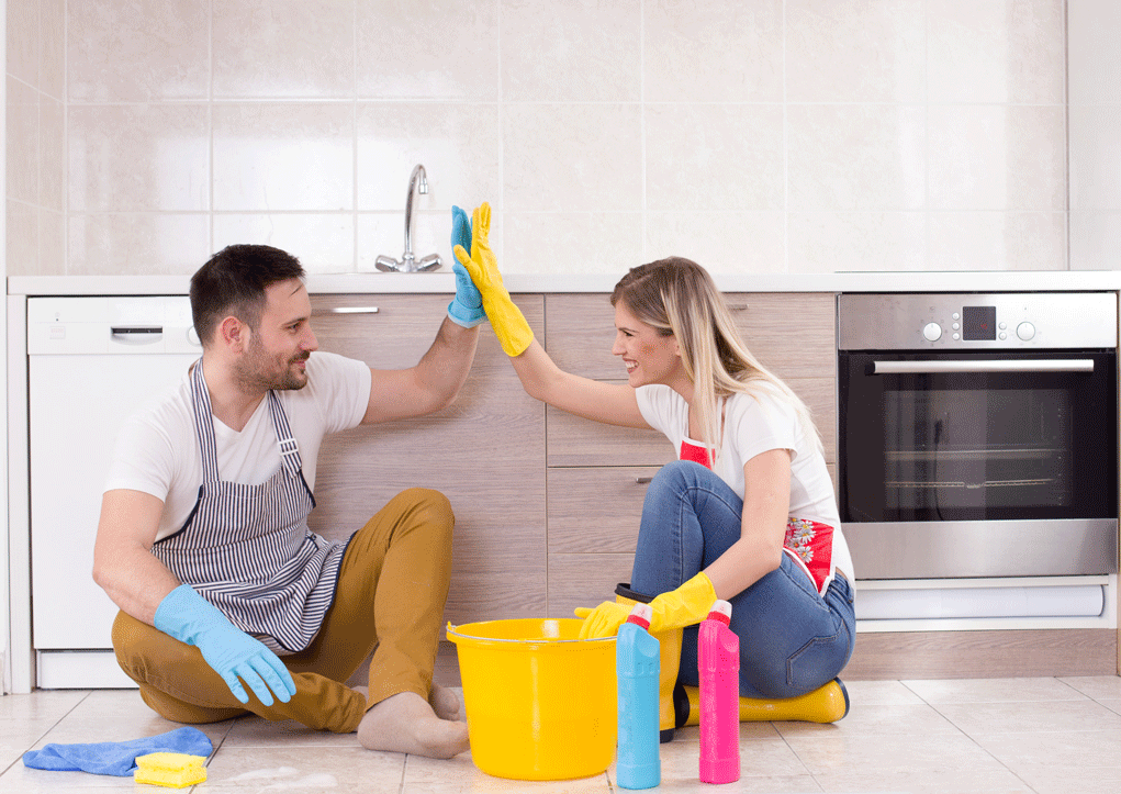 organized couple cleaning