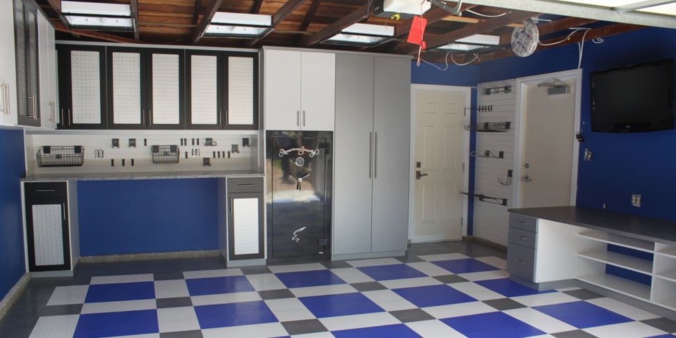 Custom Garage with blue checkered floors