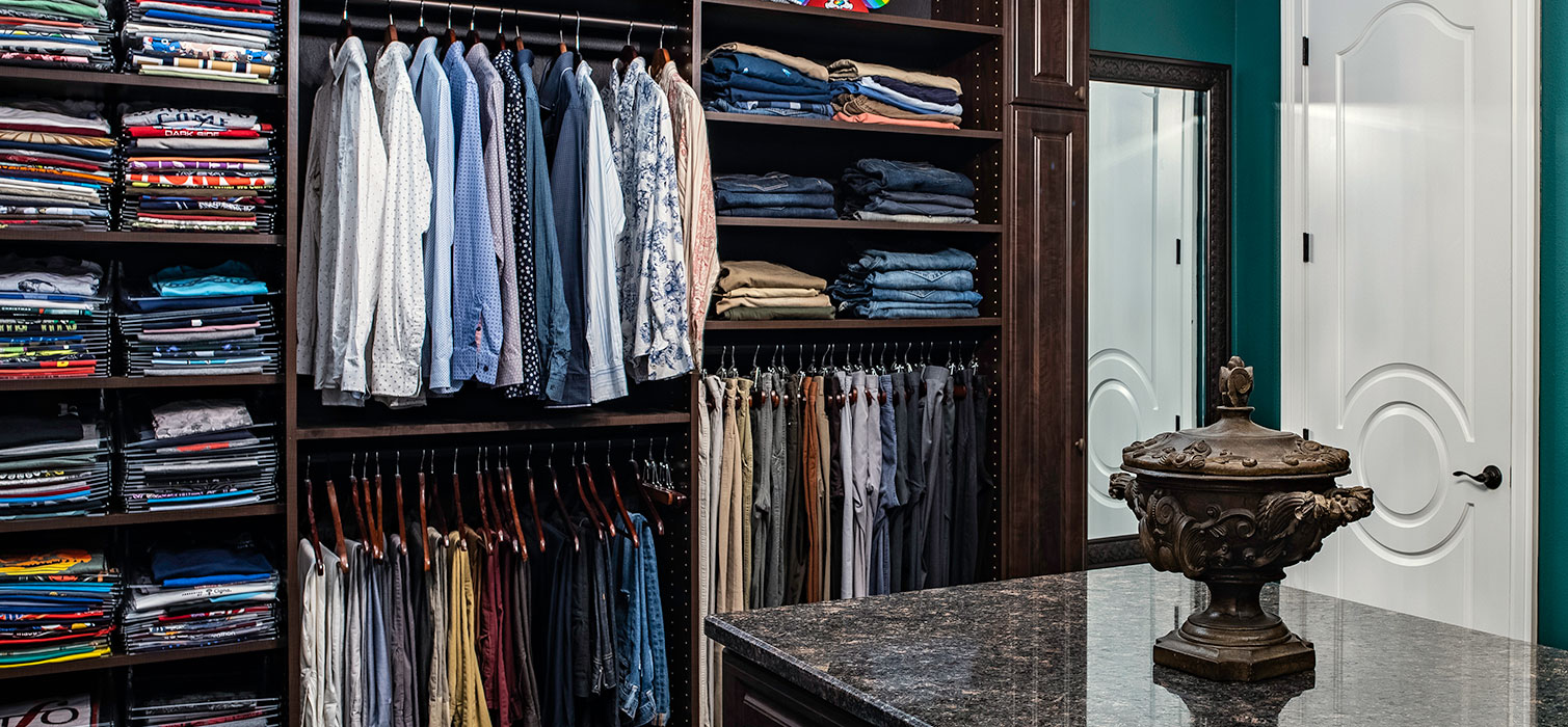 shelves with folded tee shirts