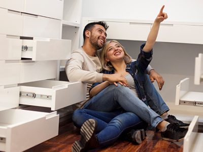 Couple in closet organizing