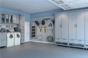 A grey garage with washing machines and garden implements