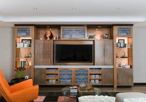 A melamine entertainment center in a medium dark wood