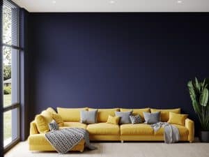 A purple living room with yellow couch
