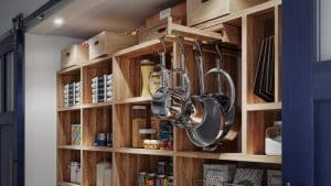 shallow pantry with blue doors