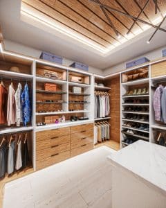 A walk-in closet featuring recessed lighting and open hanging