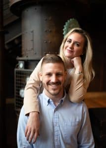 A man and woman seated for a photograph