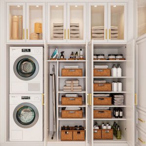 Custom laundry room with stacked washer and dryer, built-in cabinetry, and open shelving featuring woven baskets, towels, and labeled containers