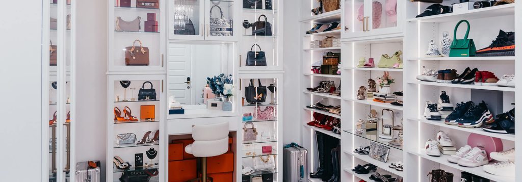 Boutique-style closet with white shelving