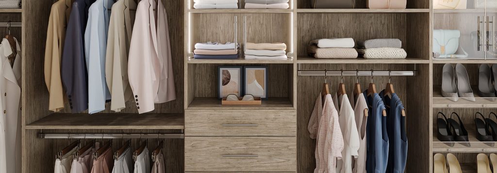 Custom walk-in closet with wood-textured built-ins, integrated lighting, double hanging rods, drawers, and open shelves showcasing organized clothing