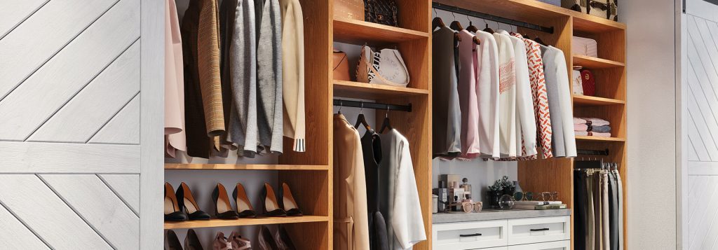 Stylish custom closet with open wood shelving, hanging rods for clothes