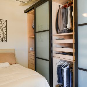 Reach-In closet with pull-out drawers for accessories and pant hangers