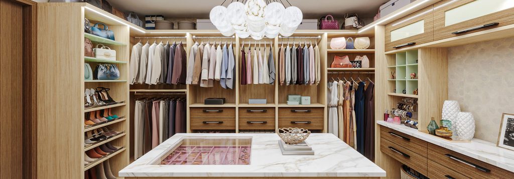 Custom walk in closet in light woodgrain melamine with center island