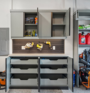 Celadon melamine with matte black extruded handles, Slatwall backing