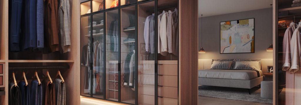 Custom walk in closet with glass front doors and LED lighting Closet Factory Seattle