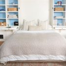 Custom white murphy bed with storage on both sides