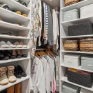 Custom walk in closet with double level hanging rods
