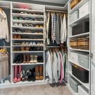 Custom walk in closet with shoe shelving