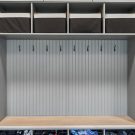 Garage entryway drop zone with shoe cubbies