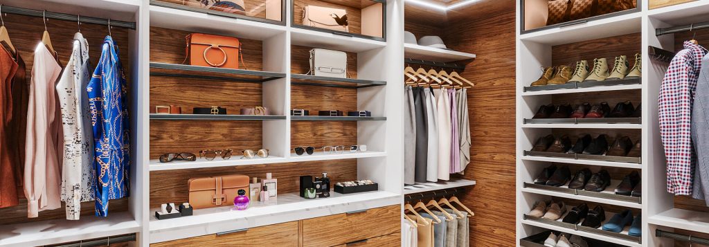 High-end custom closet with rich wood accents