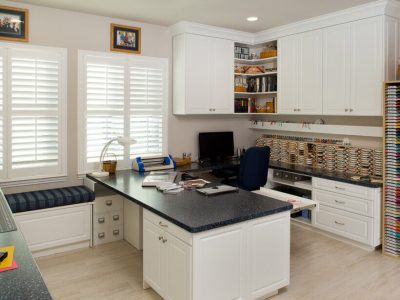 Craft room with window seat, custom island with crafting zone