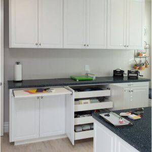 Craft room with pull out folding station and craft organizers