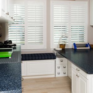 Custom craft room with window bench