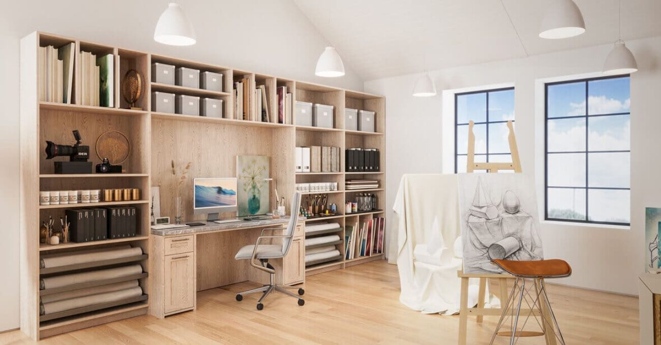 Custom craft room & art studio open shelving in Rhapsody melamine with vertical canvas slots, paper roll storage, and a built-in desk.
