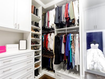 Dressing room with wedding gown glass display case
